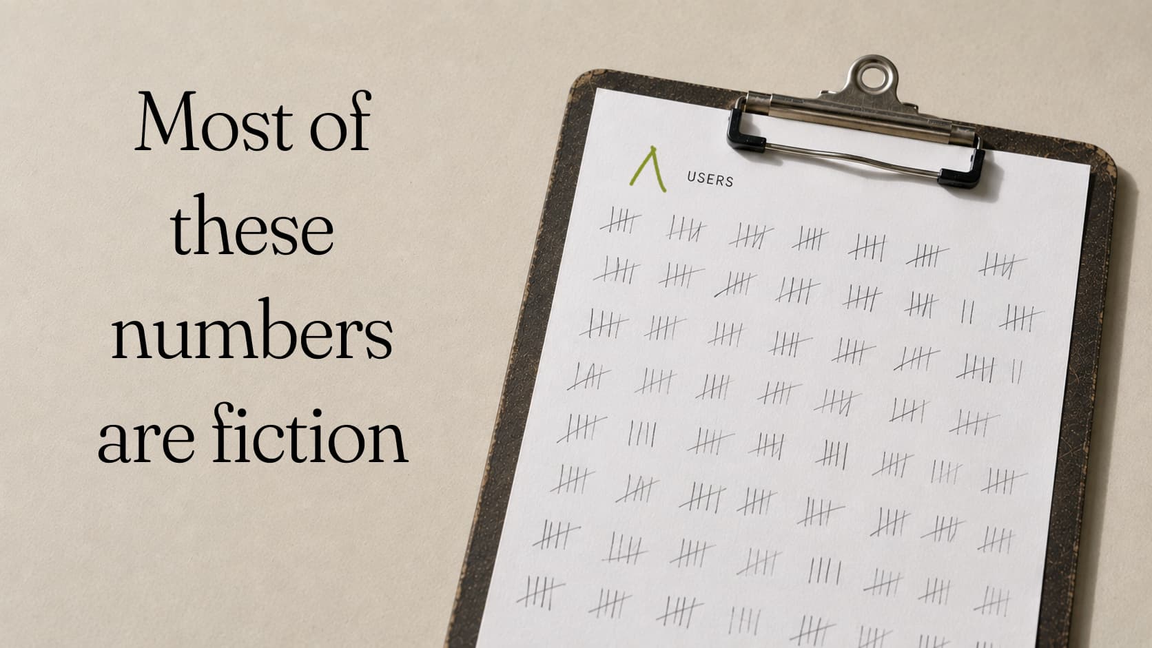 A clipboard holding a sheet of pencil tally marks headed USERS, a green insertion caret drawn before the heading. Set beside the words: Most of these numbers are fiction.